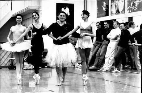 England Rugby Players Attended The Ballet Class With The English National Ballet. Brian Moore Leads The Girls With Theresa Jarvis (left) Sandra Ashwin (2nd Left) And Zara Deakin (right) On Their Points.