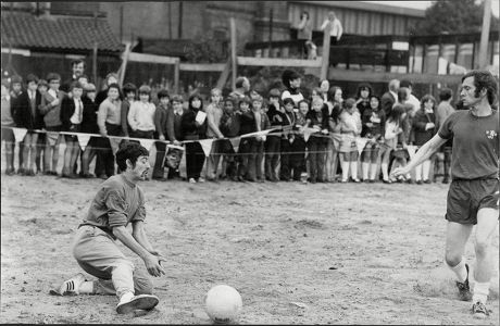 Athlete David Bedford Saves A Shot From Tom Courtney In A Five A Side Charity Mach For Deprived East End Kids.
