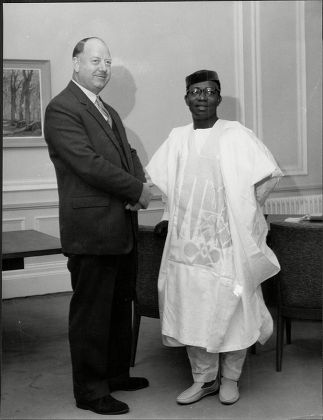 Richard Beeching (dead March 1985)chairman Of The British Railway Corporation Greets His Nigerian Counterpart Dr Okechukwu Ikejiani.