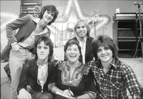 Pop Group Bay City Rollers With Television Presenter Murial Young The Bay City Rollers Were A Scottish Pop Band Whose Popularity Was Highest In The 1970s. The British Hit Singles & Albums Noted That They Were 'tartan Teen Sensations From Edinburgh'