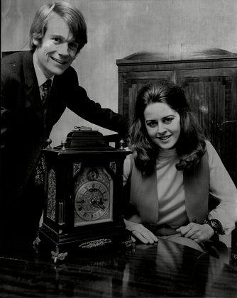 Susan Bishop And James Maxwell With Antique Mantel Clock. For Full Caption See Version.