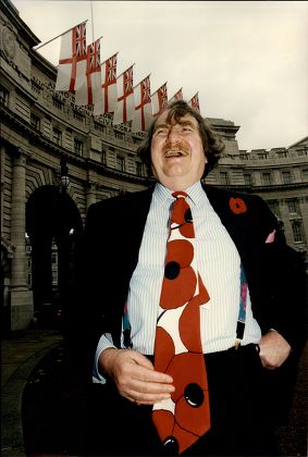 Businessman Sir John Harvey Jones At Poppy Appeal Wearing Poppy Tie Sir John Harvey-jones Mbe (16 April 1924 A 9 January 2008) Was An English Businessman. He Was The Chairman Of Imperial Chemical Industries From 1982 To 1987. He May Have Been Best Kn