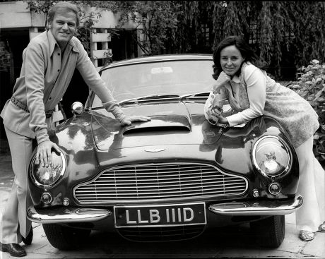Keith Michell And Jeanette Sterke With An Aston Martin Db6.