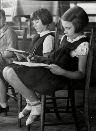 Young Girl Slouching Chair While Writing Editorial Stock Photo - Stock 