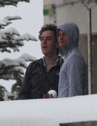 Prince Harry And Best Friend Tom 'skippy' Inskip Throw Snowballs From A Hotel Balcony At An Exclusive Swiss Resort.