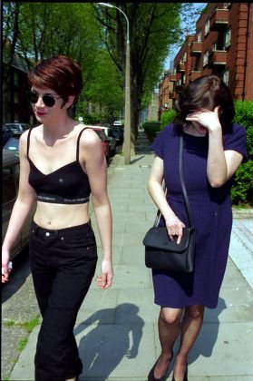 Julie Burchill And Charlotte Raven Leave Miss Raven's Flat In West London.
