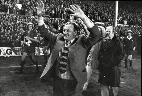 Liverpool Manager Bob Paisley Salutes The Fans After Winning The League Commentator Tony Gubba Behind Him Liverpool V Aston Villa 3-0 Robert Paisley Obe (23 January 1919 A 14 February 1996) Was An English Footballer And Manager Who Spent Almost Fifty