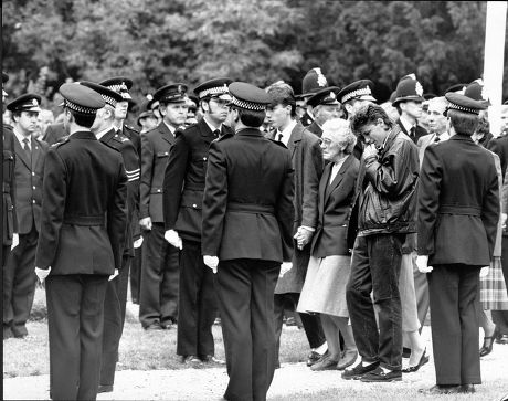 The Funeral Of Pc Roger Brereton - Shot By Michael Ryan In Hungerford - At St Mary's Church Shaw Newbury Berkshire. Relatives And Colleagues Of Brereton Including His Sons Sean (18) And Paul (18) The Hungerford Massacre On 19 August 1987. The Gunman