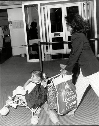 Barbara Parkins Actress At Heathrow With Her Daughter.