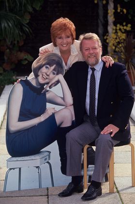 CILLA BLACK WITH HER HUSBAND AND CARDBOARD CUT OUT OF HERSELF AS A YOUNG WOMAN - SEP 1993