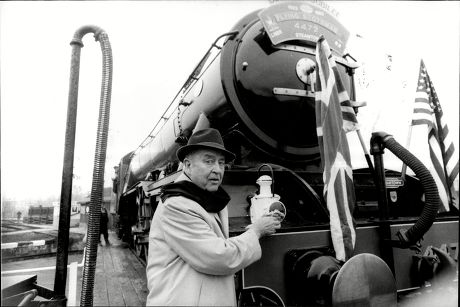 Actor Ray Milland With Steam Train The Flying Scotsman Ray Milland (3 January 1907 Oo 10 March 1986) Was A Welsh Actor And Director. His Screen Career Ran From 1929 To 1985 And He Is Best Remembered For His Academy Awardoowinning Portrayal Of An Alco