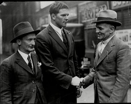 South African Boxer Ben Foord (centre) Greeted By Boxing Manager Ted Broadribb (right) On The Left Is Louise Walsh Foord's Manager.