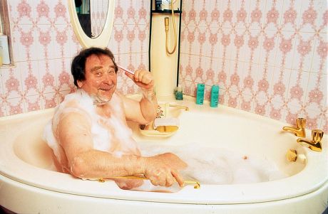 BERNARD MANNING AT HOME IN MANCHESTER, BRITAIN - 1994
