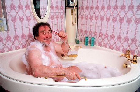 BERNARD MANNING AT HOME IN MANCHESTER, BRITAIN - 1994