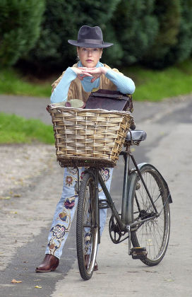 Lady Henrietta Bathurst With Her Victorian Bike........ Lady Henrietta Bathurst Fashion Designer Daughter Of Earl Bathurst With A Bicycle She Found On Her Parents' Cirencester Park Estate. Picture Kevin Holt For Nigel Dempster Diary.