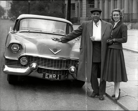 Edmundo Ros (died 10/11) Trinidadian Musician And Bandleader With Wife Britt And The Cadillac Motor Car Entered For Goodwood Races.