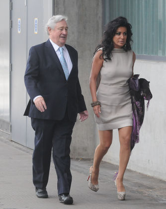 Nancy Dell'olio And Geoffrey Robinson Arrives At The Emirates Stadium In London For The Tony Blair Fundraiser Tonight.