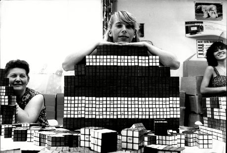 Eva Toth Aged 20 With A Mountain Of Rubik's Cubes.