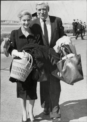 Actors Andre Morell And Joan Greenwood At London Airport.