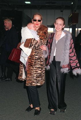 JERRY HALL WITH HER BABY GABRIEL LUKE BEAUREGARD - SON OF MICK JAGGER - WITH DAUGHTER ELIZABETH AT HEATHROW AIRPORT - 1998