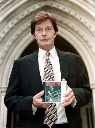 ROBERT TRINGHAM HOLDING THE BRUCE SPRINGSTEEN CD ' BEFORE THE FAME' WHICH IS AT THE CENTRE OF THE HIGH COURT BATTLE BETWEEN THE TWO MEN, LONDON, BRITAIN - 08 OCT 1998