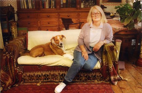 Daphne Bewes (nee Black) Wife Of Actor Rodney Bewes Photographed At Her Putney Home With Her Dog Harvey. She Sits On A Sofa With The Dog. Original Held In Kensington.