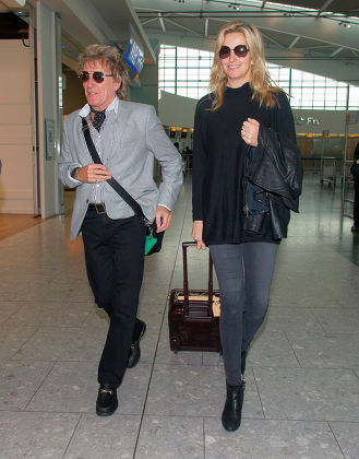 Rod Stewart and Penny Lancaster at Heathrow Airport, London, Britain ...