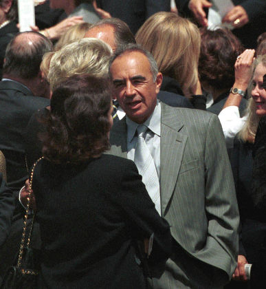 Sydney Poitier and Carole Bayer Sager at the Funeral of Frank Calcagini