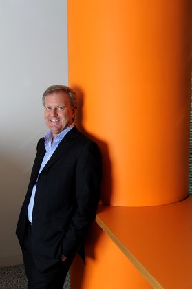 Tom Alexander Chief Executive Officer Orange Uk At His Paddington (london) Office. Even For A Company That Sells Itself On The Promise Of A 'bright' Future The Boss Of Mobile Phone Giant Orange Is Relentlessly Upbeat. No Glass Touched By Human Lip
