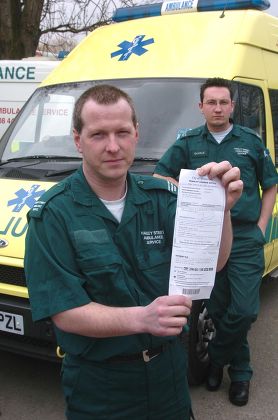 Harley Street Ambulance Service Operations Manager Steve Fleming (white Shirt) With Emergency Medical Technician (and Driver) Jason Eldridge (left) And One Of The Westminster Parking Tickets With Fellow Emt Charles Weeks Bell (right) . Picture Murray