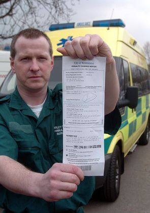 Harley Street Ambulance Service Operations Manager Steve Fleming (white Shirt) With Emergency Medical Technician (and Driver) Jason Eldridge (left) And One Of The Westminster Parking Tickets With Fellow Emt Charles Weeks Bell (right) . Picture Murray
