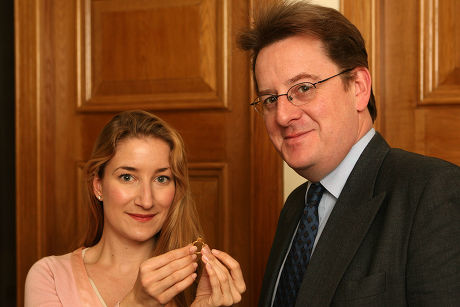 Robert Hardman And Helen Molesworth Of Christies With A Ring Found At Manley Hall Cheshire. Treasure Hunter John Wood Was Baffled By A Mysterious Code Engraved On The Ring But Now The Riddle Has Been Deciphered And The 650-year-old Piece Of Jewellery Could Be Worth Ii100 000.