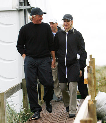 Greg Norman And Chris Evert Stroll Out On The First Day Of The Open Championship At Royal Birkdale.