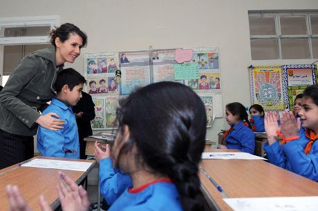 Asma al-Assad visits the Martyr's Daughters' School in Damascus, Syria - 09 Jan 2014