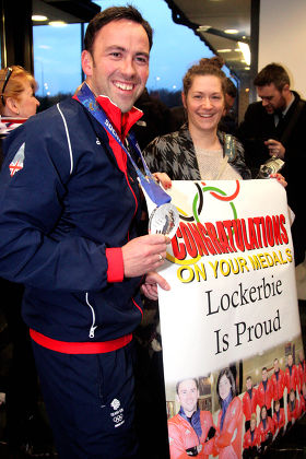 British Winter Olympic Curling teams return home, Edinburgh Airport, Scotland, Britain - 25 Feb 2014