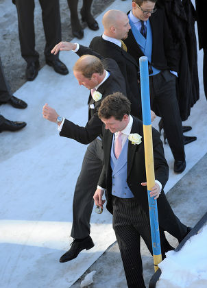 Arosa Switzerland. Wedding Of Laura Bechtolsheimer And Mark Tomlinson In Arosa Attended By William Harry And Kate. William Jokingly Slides Down An Icy Slope From The Church And Has A Laugh With Other Guests. Stephanie Schaerer 02/03/2013 004478784668