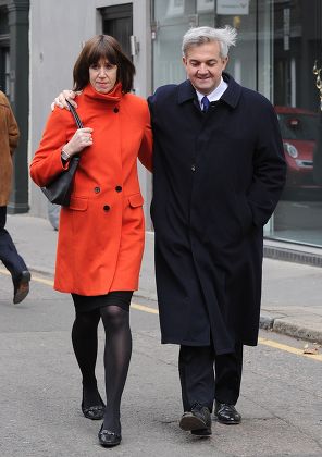 London. A Smiling Chris Huhne And His Partner Carina Trimingham Leave Their Flat In Old Street On The Way To Southwark Crown Court Where Mr Huhne Is Being Sentenced This Afternoon. Stephanie Schaerer 11/03/2013 00447878466804.