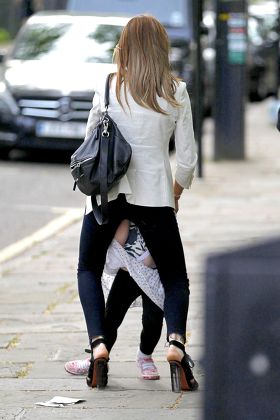 Abbey Clancy and Peter Crouch out and about in London, Britain - 07 May 2014