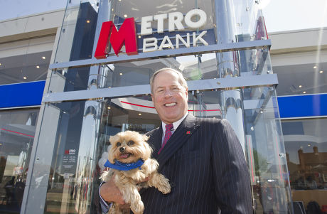 Metro Banking Boss Vernon Hill At The New Drive Through Bank In Slough. Sir Duffield The Dog Poses With Mr Hill.