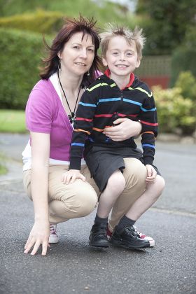 Chris Head Aged 6 With His Mother Suzi Chris Suffers From Ricketts Due To A Vitamin D Defficiency And Suzi Thinks It Was Caused By High-factor Sunscreen.