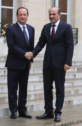 French President Francois Hollande and President of the Syrian National Coalition, Ahmad Jarba, meeti at the Elysee palace in Paris, France - 20 May 2014
