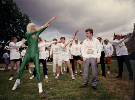 Lords V Commons Tug Of War For Charity. 4th Lord Moynihan ( Colin Moynihan ) (front Right) Exercising With The 'green Goddess' Diana Moran.