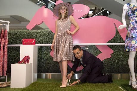 Debenhams installs mini 'grass paddock' so racegoers can test out high heels, Oxford Street, London, Britain - 29 May 2014