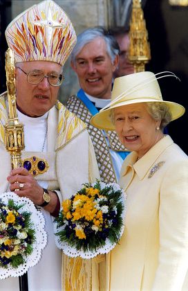 QUEEN ELIZABETH II AND PRINCE PHILIP  VISIT CANTERBURY CATHEDRAL TO DISTRIBUTE MAUNDY MONEY, BRITAIN - 28 MAR 2002