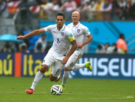 The FIFA captain's armband and tattooed arm of Clint Dempsey of USA