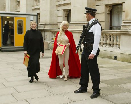 JACQUELINE DE BAER DRESSED AS LADY GODIVA HANDING IN PETITION TO NO 11 DOWNING STREET, LONDON, BRITAIN - 19 SEP 2002