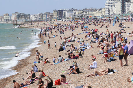 People Sunbathing On Beach Editorial Stock Photo - Stock Image ...