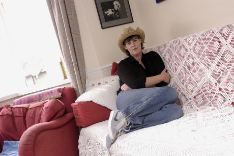 JANE MILLIGAN, DAUGHTER OF SPIKE, AT HOME IN HIGH BARNET, LONDON, BRITAIN - 28 MAR 2003