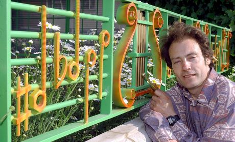 HENRY DAGG, WHO SPENT 5 YEARS AND £60,000 TURNING HIS GARDEN FENCE INTO A GIANT GLOCKENSPIEL, FAVERSHAM, KENT, BRITAIN - 29 MAY 2003