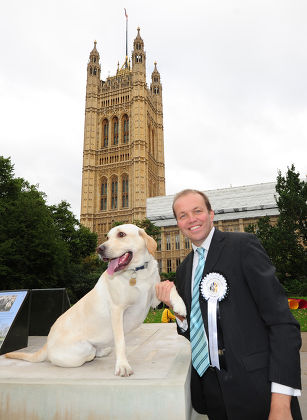 Westminster Dog Of The Year In Victoria Tower Gardens Outside The House Of Lords. Mps Bring Their Dogs To Compete For Westminster Dog Of The Year Held By The Dog Trust. Pictured: David Burrowes Conservative Mp For Enfield Southgate And His Dog Cholme